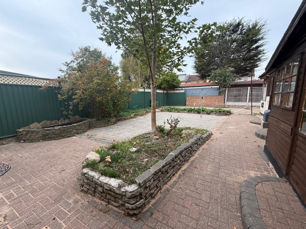 Lot: 137 - DETACHED HOUSE WITHIN EASY REACH OF THE VIBRANT LEIGH BROADWAY - Rear garden with outside storage and side access